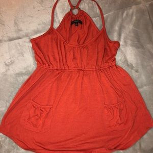 Orange crop top with pockets on front